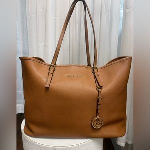 Brown leather Michael Kors tote bag with gold hardware